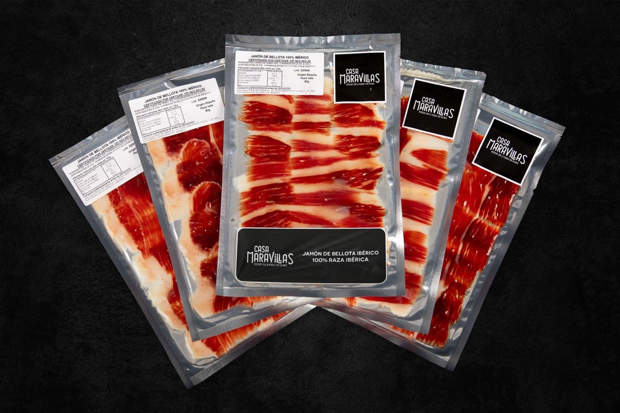 Iberian Select Foods 100% acorn-fed Iberian ham, still-life presentation with cured ham and rustic styling